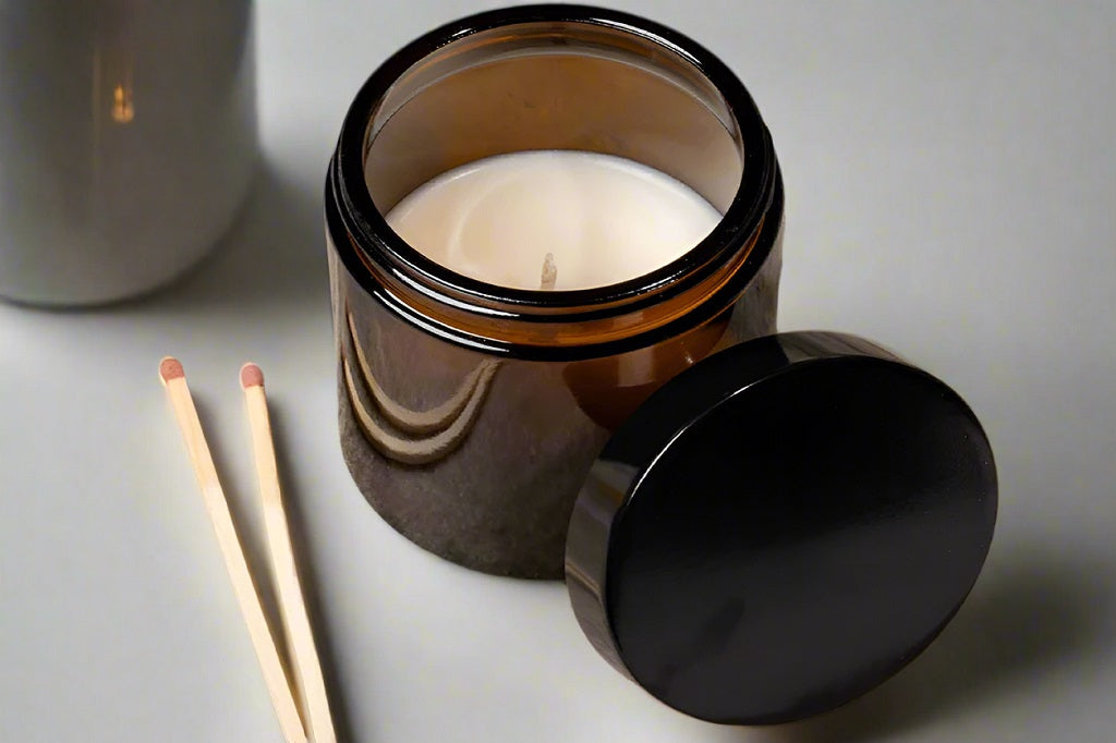 Hand poured apothecary style amber glass jar candles